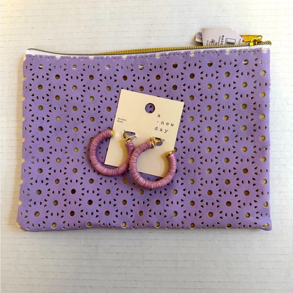 A New Day Purple Clutch and hoop earrings set.